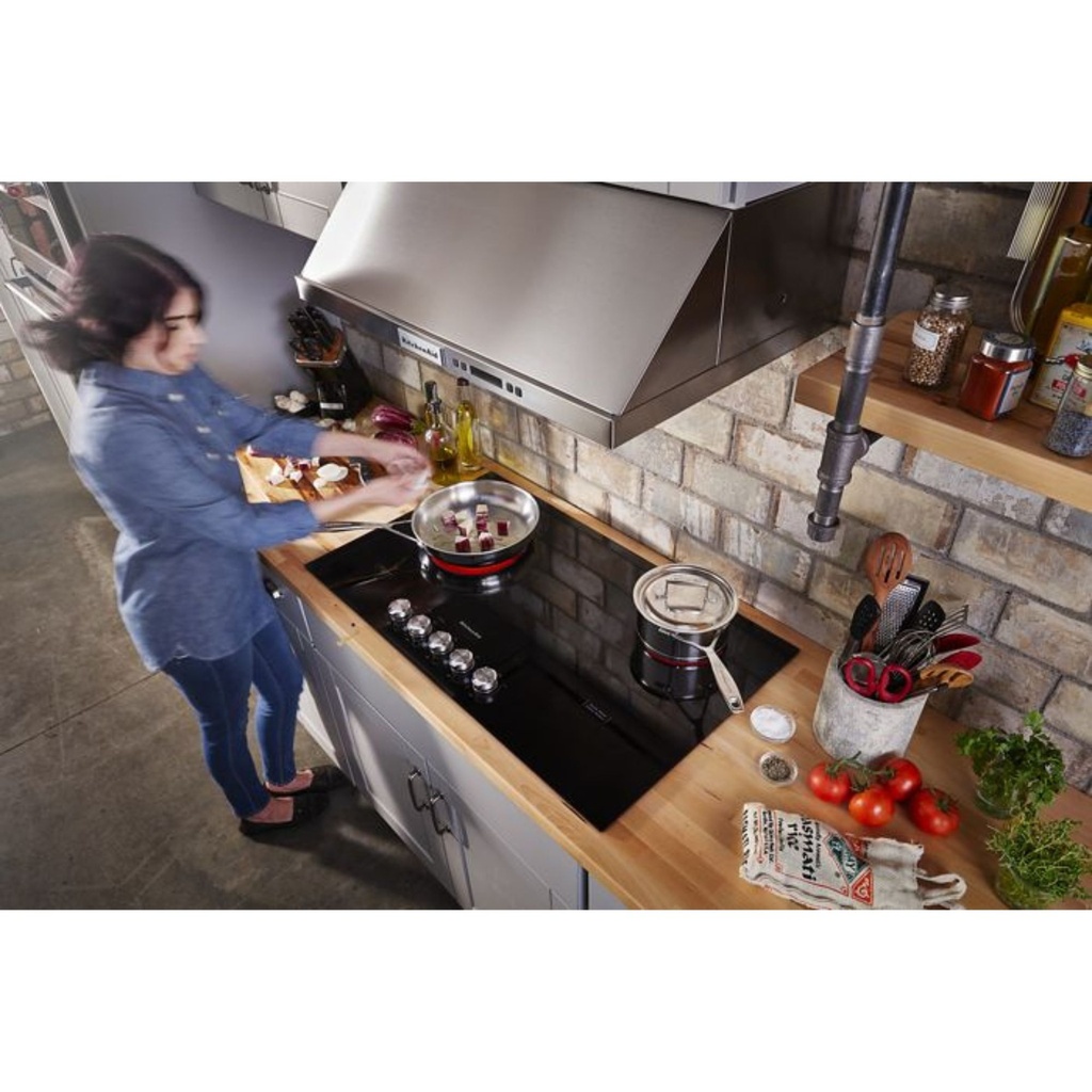 KitchenAid-KCES556HBL-modern kitchen with electric cooktop