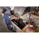 KitchenAid-KCES556HBL-modern kitchen with electric cooktop