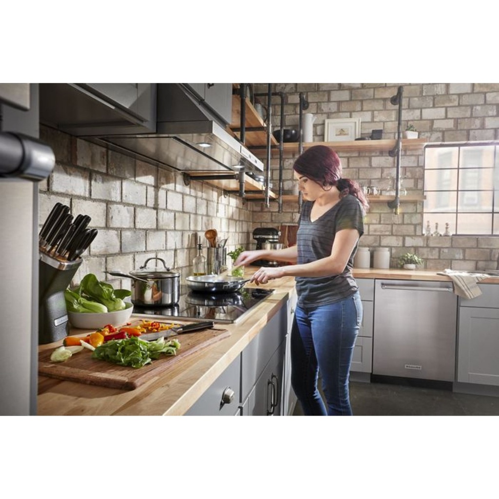 kitchenaid-KCES950KSS-modern kitchen workspace with electric cooktop