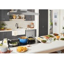 KitchenAid-KCIG556JSS-modern kitchen workspace with cooktop