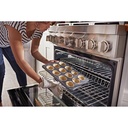 KitchenAid-KFDC506JSS-modern kitchen workspace with burner