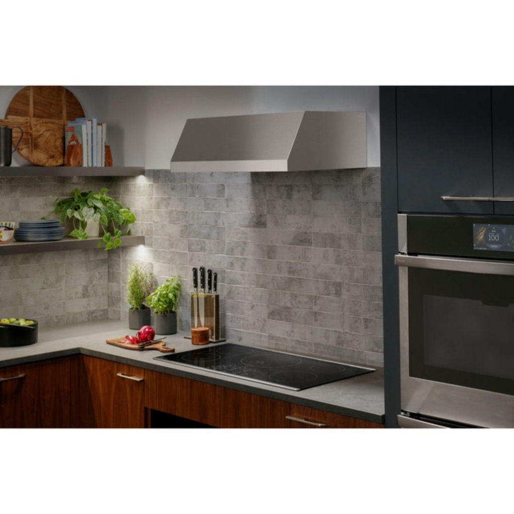 GE-PHP9036DTBB-Modern kitchen with an induction cooktop and range hood